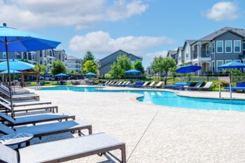 Resort-style swimming pool with sundeck